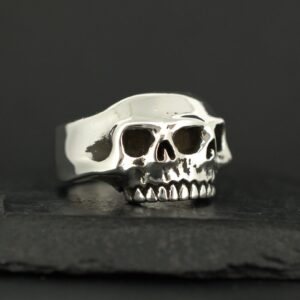 Silver ring designed as a double-layered skull.
