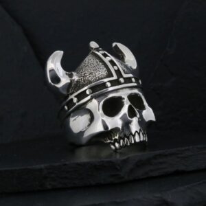 Metal skull wearing a Viking helmet with horns.