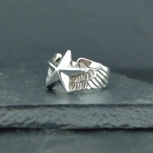 Silver ring featuring an eagle design with spread wings.