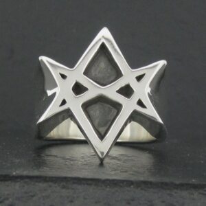 Silver ring featuring a geometric star design.