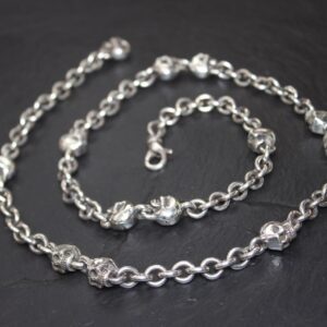 Elegant silver chain necklace with a lobster clasp.