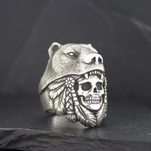 Silver ring featuring a skull with a Native American headdress design.