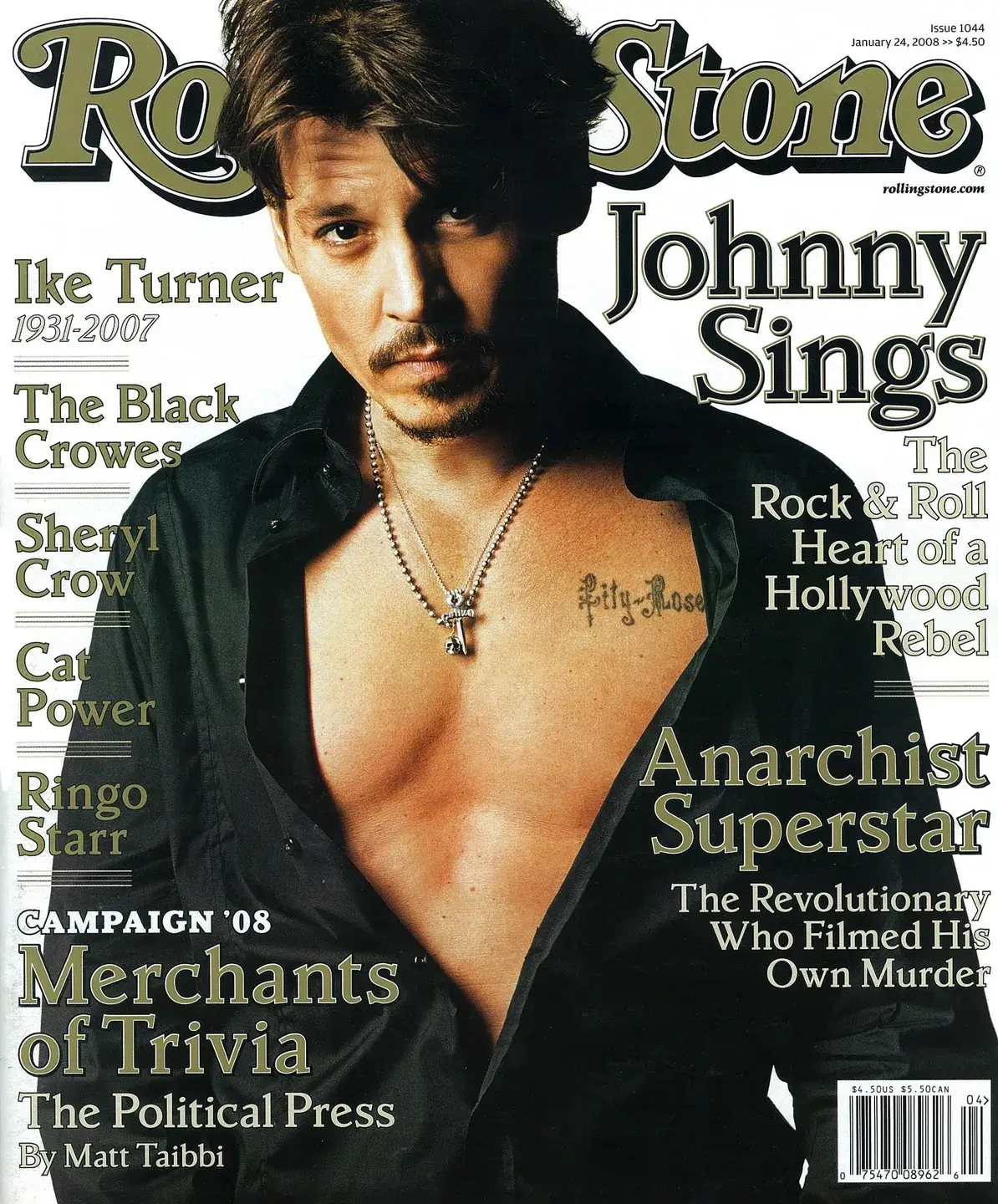 Johnny Depp on Rolling Stone cover, shirt open showing chest tattoos.